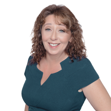 Smiling woman with curly brown hair wearing a teal top.
